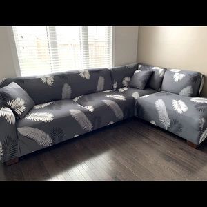 Grey leaf motif couch cover.